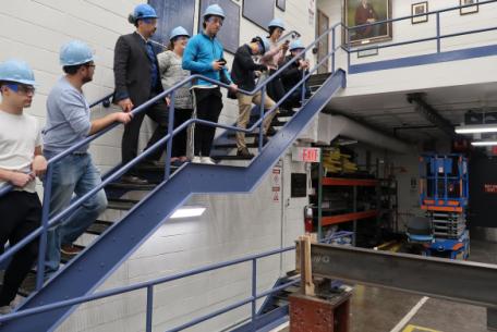 Students observing a buckling demo